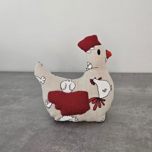 Cale porte poule tissu poule vue de côté. Pour éviter que les portes claquent.