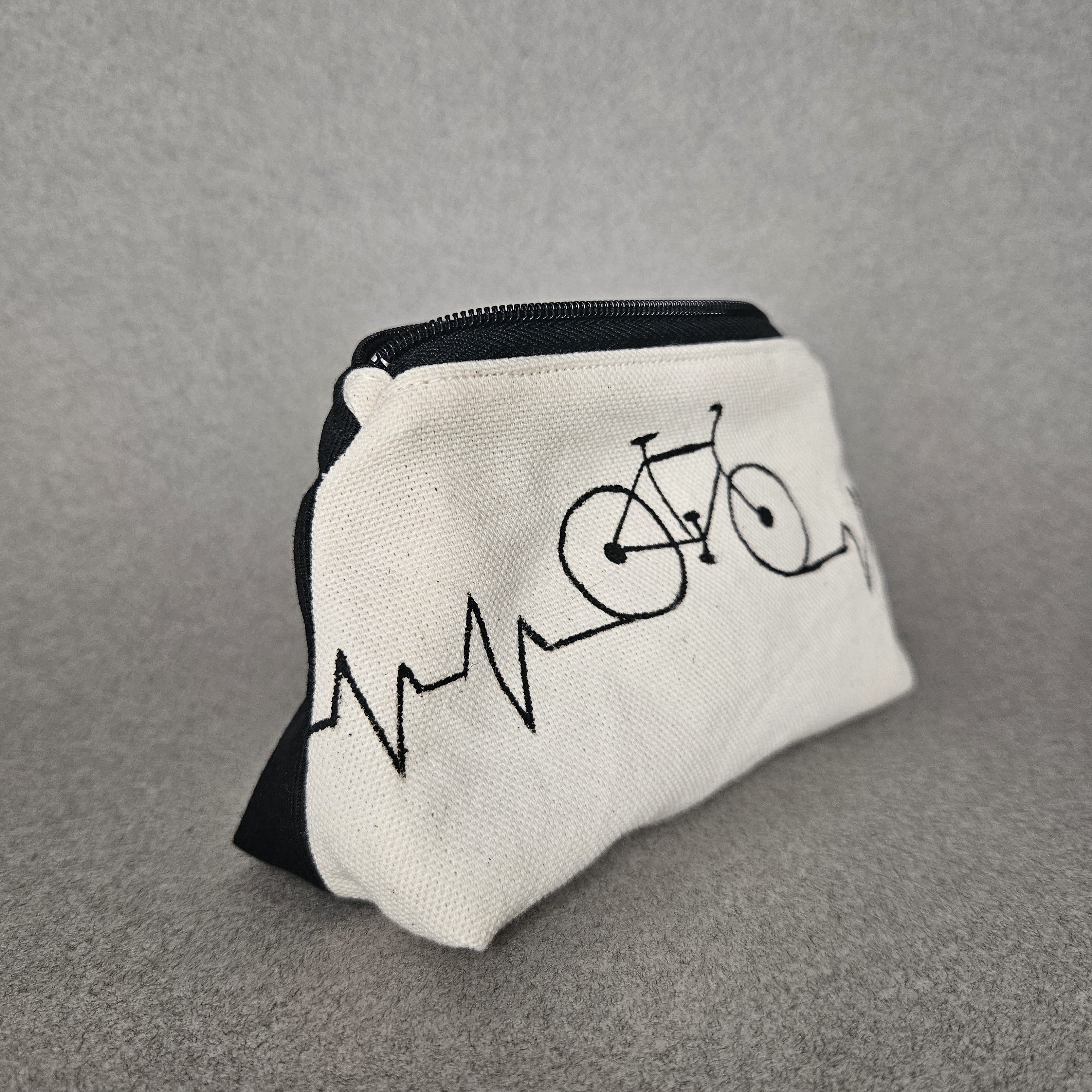 Vue de côté porte-monnaie vélo