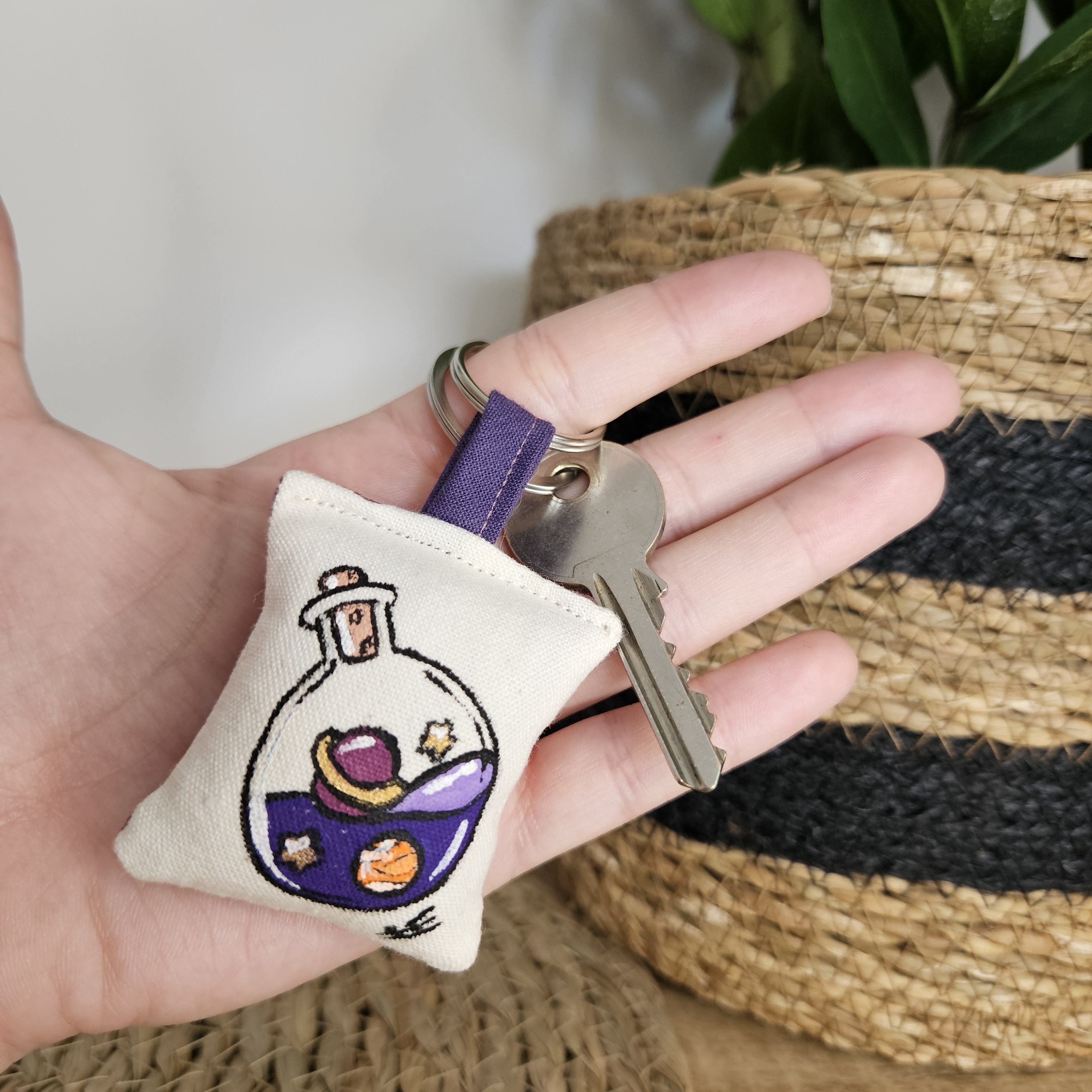 Porte-clé potion violette, planète