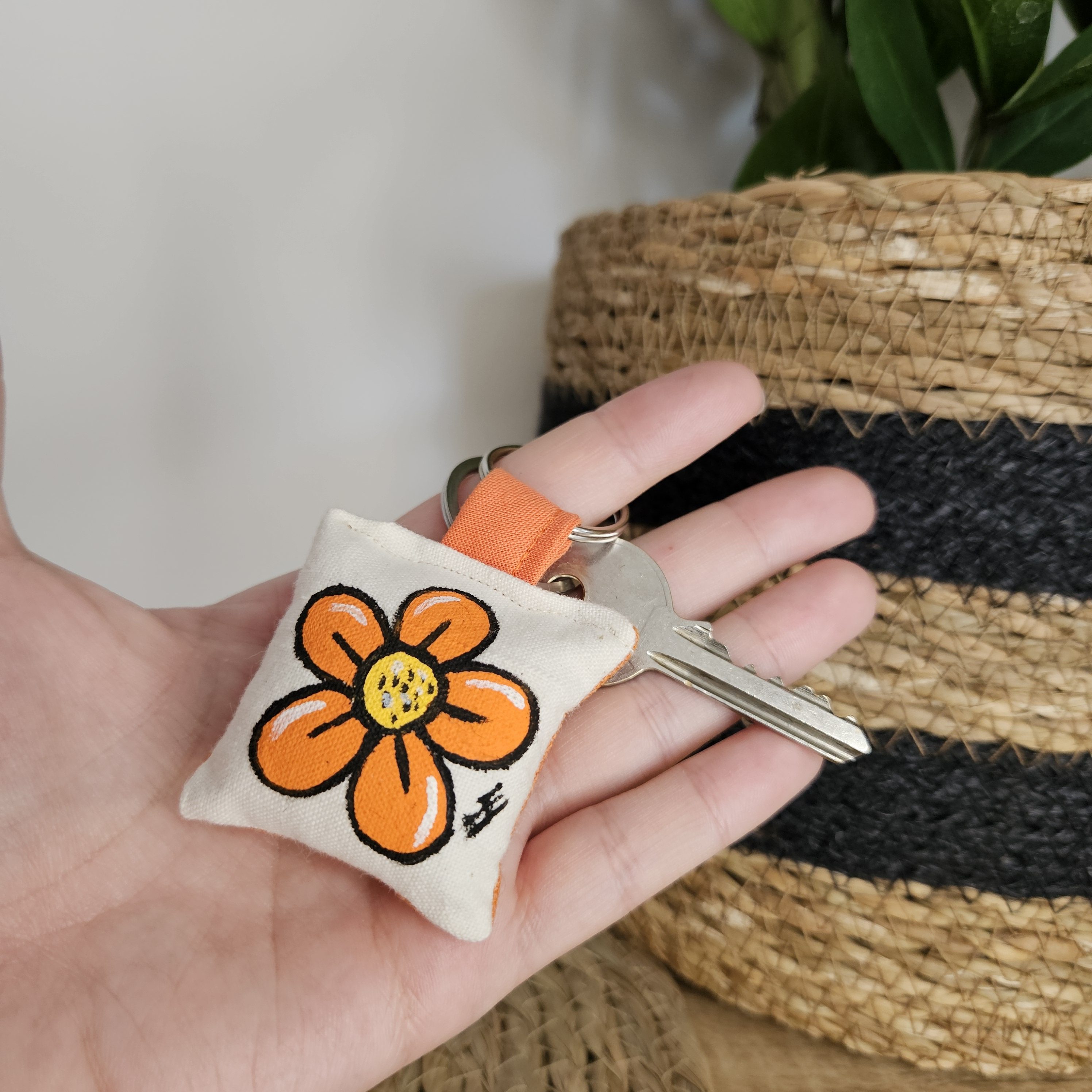 Porte-clé fleur orange anneau en métal pour accrocher