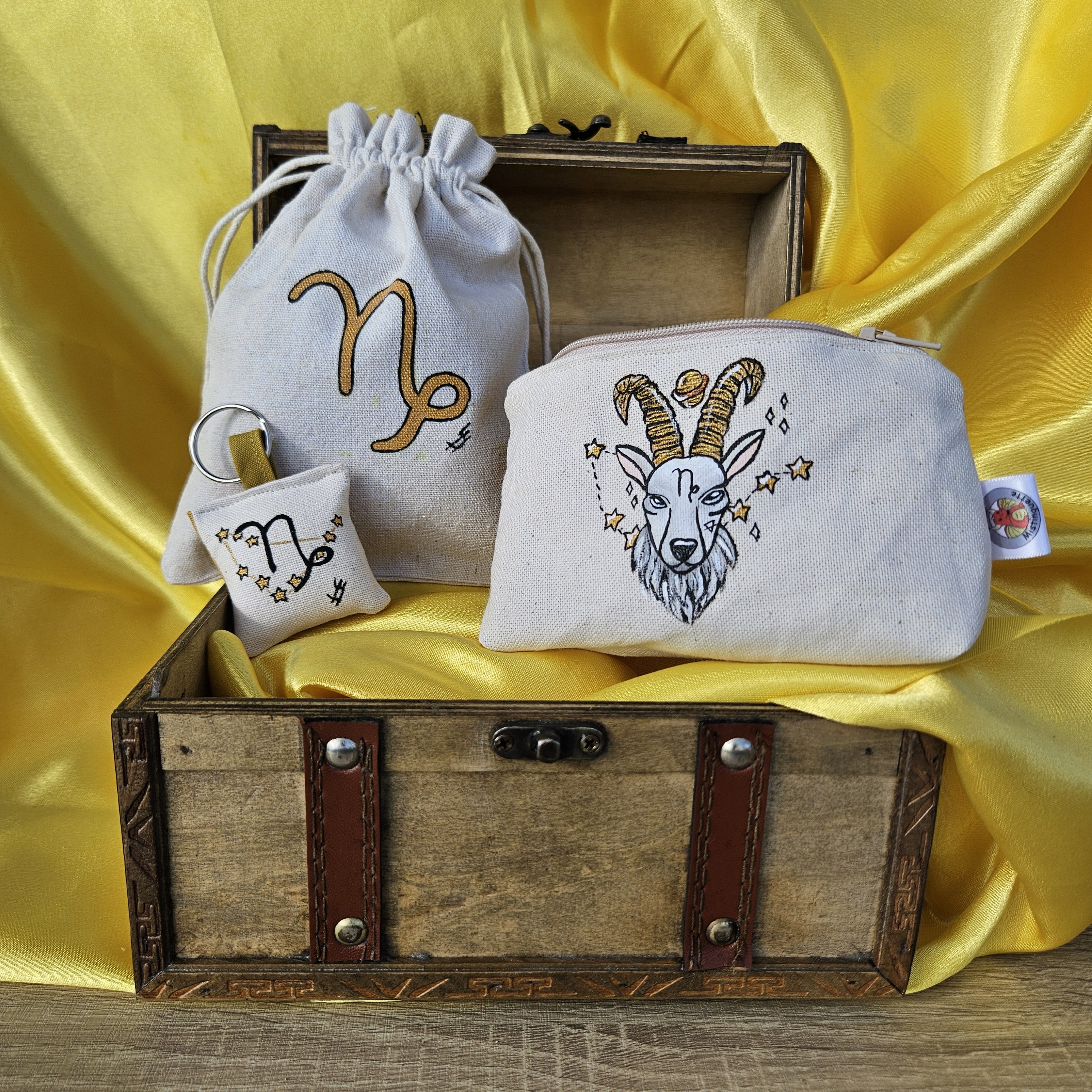 Coffret porte-monnaie et porte-clé Capricorne avec leur pochon réutilisable